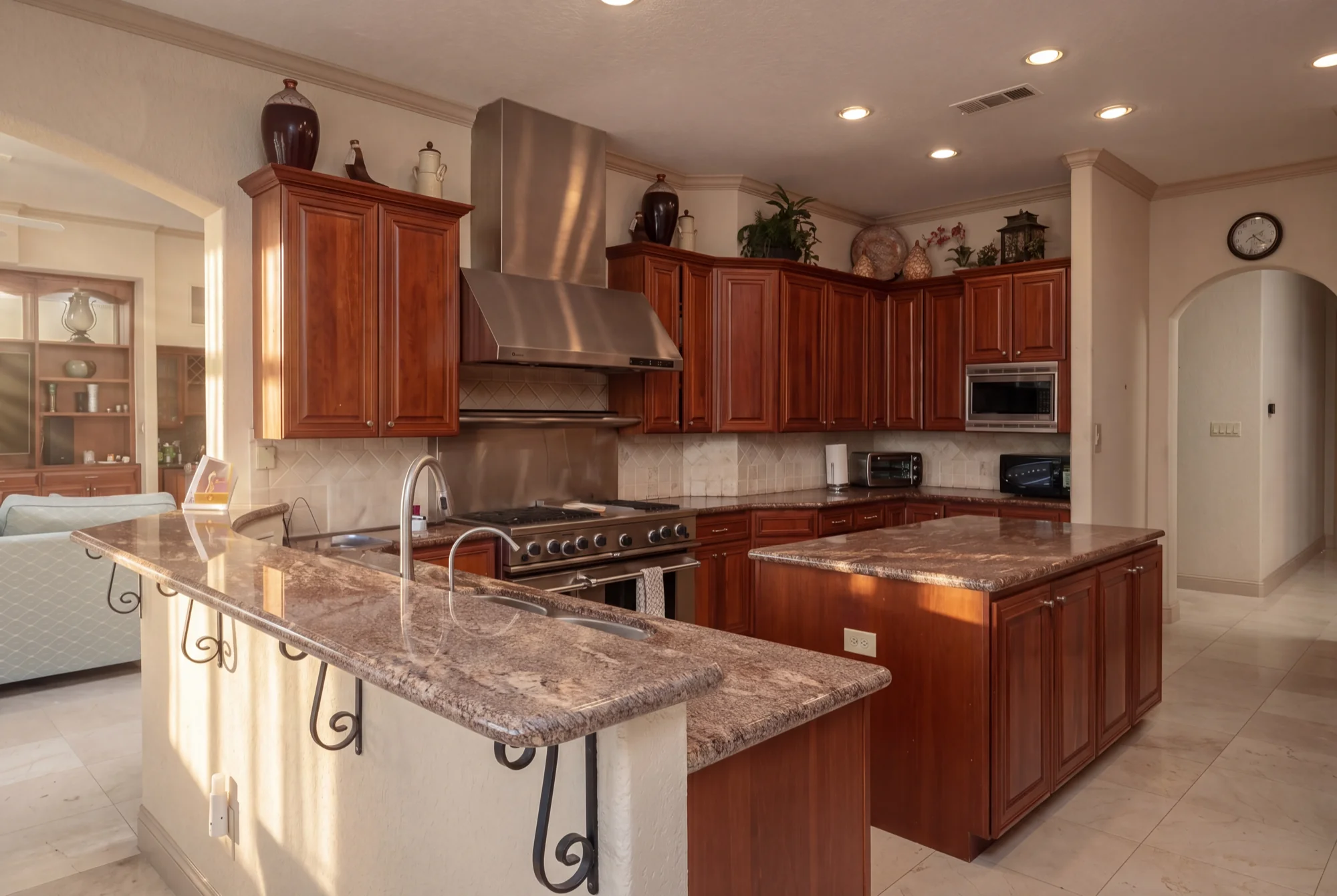 Gourmet kitchen with granite and island